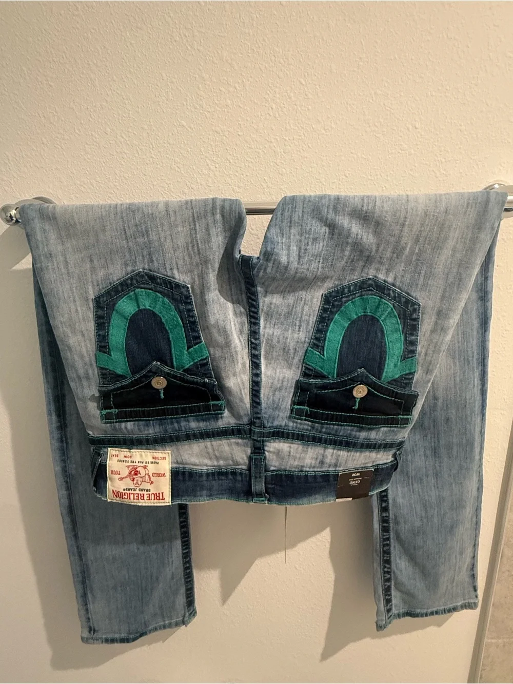 True Religion Light Wash Jeans with Green Back Pocket Accents